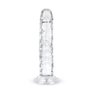 Jelly Dildo 14 cm Utan Pung är en realistisk, genomskinlig leksak som står upprätt på en platt bas och kombinerar elegans med verklighetstrogna detaljer.