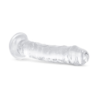 Jelly Dildo 14 cm Utan Pung, en genomskinlig dildo med utsvängd bas, visas liggande på en vit bakgrund.