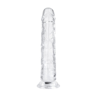 Transparent Jellydildo 20 cm står upprätt med en klar, ådrad struktur och utsvängd sugbotten, på en vit bakgrund.
