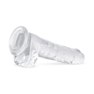 Jelly Dildo 19 cm Med Pung är en transparent, realistisk dildo med pung för både vaginal och anal stimulans, elegant presenterad på en vit yta.