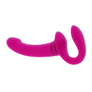 Evolved Novelties Strapless Strapon är en ljusrosa, dubbeländad strapless dildo med en böjd och en bulbös ände, tillverkad av kroppssäkert silikon, visad på en vit bakgrund.