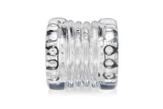 Transparent Ball Stretcher XR är en klar, texturerad silikonballstretcher med åsar och en nubbig inre yta för ökad orgasmfördröjning, visas på en vit bakgrund.