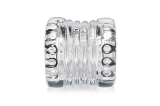 Transparent Ball Stretcher XR är en klar, texturerad silikonballstretcher med åsar och en nubbig inre yta för ökad orgasmfördröjning, visas på en vit bakgrund.