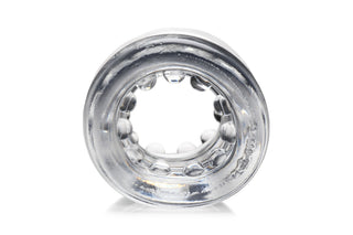 Transparent Ball Stretcher XR, ett klart cirkulärt föremål med en strukturerad inre yta, visas framifrån mot en vit bakgrund.