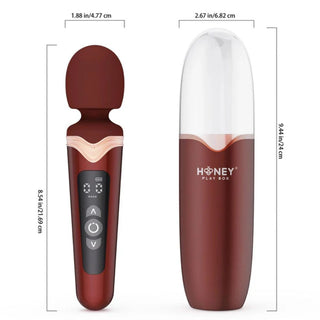 Handhållen vibrator i röd silikon med kontrollknappar och böjd design, visas med förvaringsväska och storleksmarkeringar.