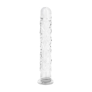 Ribbad dildo i klart glas, cylindrisk med rundad spets och platt, cirkulär bas, 19 cm lång.