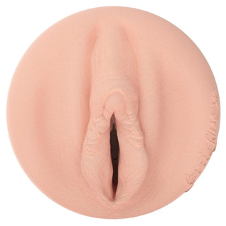 Fleshlight Girls Bonnie Blue 1K vulva masturbator i ljus hudton, tillverkad av superskin silikon, sedd ovanifrån.