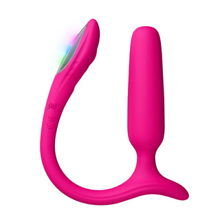 En appstyrd analvibrator i rosa silikon med böjd design, mot en vit bakgrund.