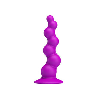 Analplugg i lila silikon, 17 cm lång, med sugproppsbas, visas upprätt på en vit bakgrund.