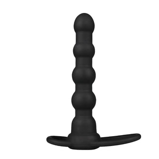 Lovetoy Dubbel Trouble Penisring tillverkad av svart silikon, med pärlformad design och utsvängd bas, visas upprätt mot en vit bakgrund.