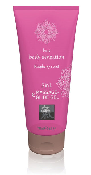 Shiatsu 2-in-1 Massage & Glidmedel, en hallondoftande bärkroppsgel i en rosa 200ml tub, på vit bakgrund.