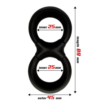 Bilden föreställer Beast Rings Dubbel Penisring 25 mm, ett svart figur-åtta-format föremål med två cirkulära öppningar gjorda av kroppssäker silikon. Båda cirklarna har en innerdiameter på 25 mm, och botten har en ytterdiameter på 45 mm. Dess längd är markerad som 89 mm, perfekt för längre erektioner.