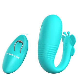 Turkos silikonvibratorägg med fjärilsdesign och en matchande turkos fjärrkontroll.
