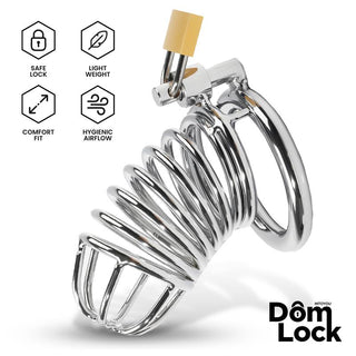 Kyskhetsbur i kromad metall med hänglås, med ikoner som anger säkerhet, komfort och luftflöde på förpackningen.