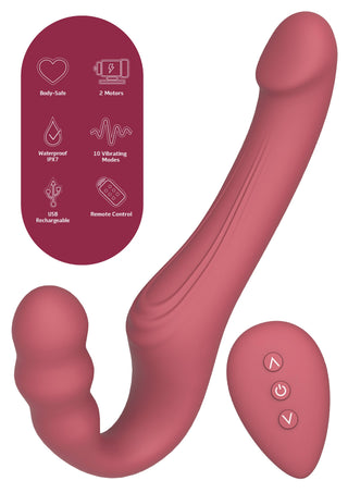 Lila strap-on-vibrator i silikon utan remmar, med fjärrkontroll, två böjda ändar och en slät yta.