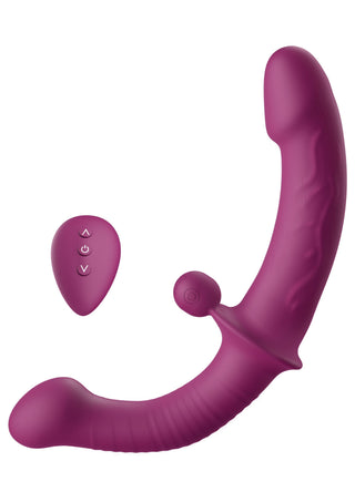 En dubbelsidig lila G-punktsvibrator i silikon med trådlös fjärrkontroll, avbildad mot en enfärgad vit bakgrund.