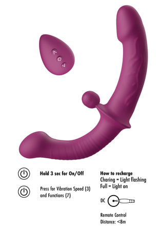 På bilden visas en lila, dubbelsidig G-punktsvibrator i silikon med böjd design, trådlös fjärrkontroll och USB-laddningskabel.