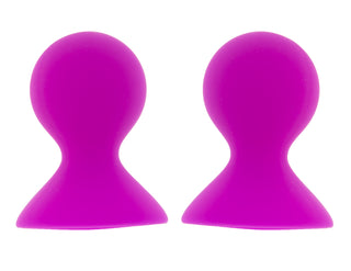 Magenta färgade sugkoppar av silikon med utsvängda baser och rundade toppar.