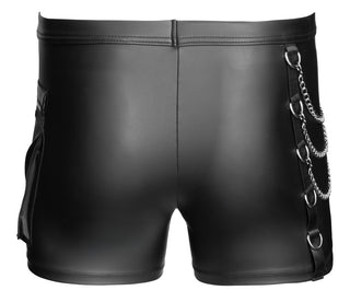 NEK Pants Matt Svart: svarta matta byxor med kedjedetaljer och metallringar på höger sida, med en tight passform, visade bakifrån.