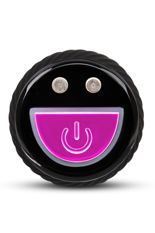 Lägg till en lekfull touch till ditt sexleksaksset med Sex Room Vibe Kit - en rund svart vibrator med en rosa smiley, silverögon och en kraftsymbol för munnen.