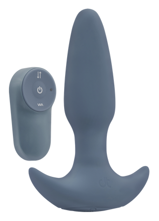 Mörkgrå vattentät analvibrator med utsvängd bas, tillverkad av slätt material, tillsammans med en matchande fjärrkontroll.