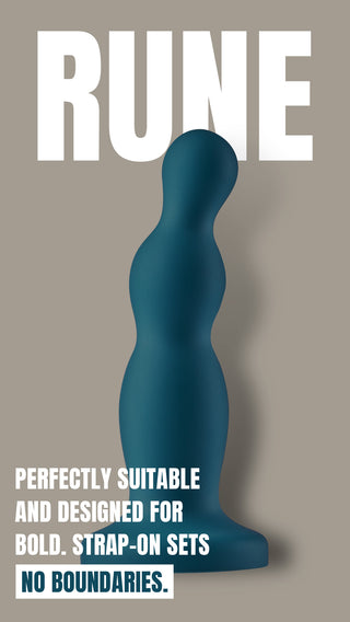En turkosfärgad silikondildo med en böjd, rundad form och en sugkopp i botten.