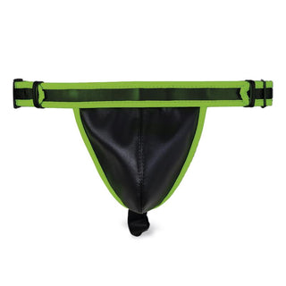 Shining Line Glow Jockstrap är en svart och grön påse med justerbara sidoband, tillverkad av veganskt läder och med en snygg, modern design.