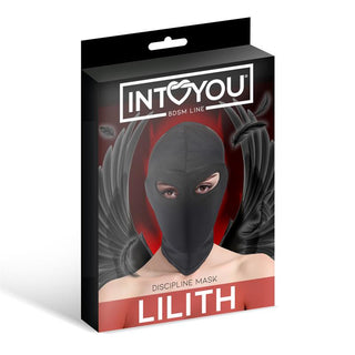 Box med INTÖYOU BDSM Line Discipline Mask visar upp en bevingad figur som bär den eleganta IntoYou BDSM-masken, tillverkad av elastiskt material med spännande ögonöppningar.