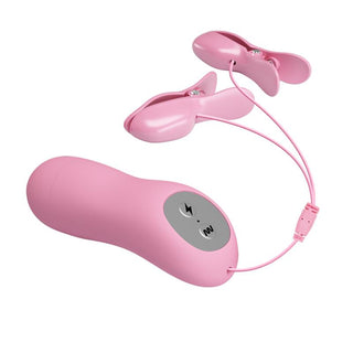 E-Stim Bröstklämmor Med Vibration är en rosa fjärrstyrd enhet med två trådbundna tillbehör för elektriska stimulanser och skonsam vibration.