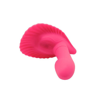 Muslingformad massageapparat i rosa silikon med böjd design och texturerade kanter.