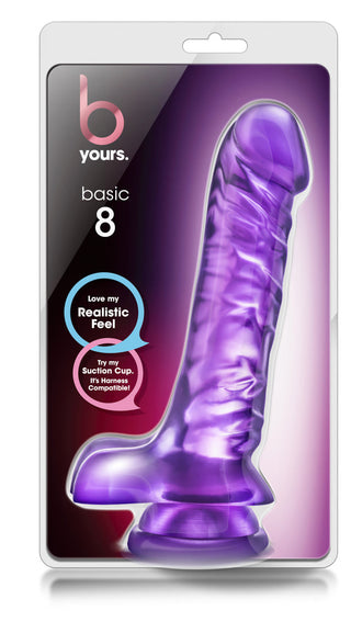 Lila realistisk dildo med sugkopp, tillverkad i slät material och förpackad i genomskinlig plast.