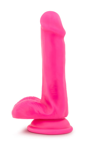 Neonrosa Dildo 15 cm Dual Density, med en realistisk form och stark sugbas, visas på en vit bakgrund.