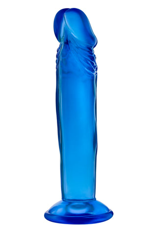 Rosa dildo i PVC, 15 cm lång, med realistisk design och platt bas, står mot vit bakgrund.