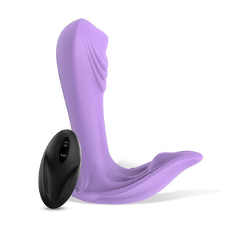 Engily Ross Donnyel Trosvibrator är en lila ergonomisk bärbar enhet gjord av premium silikon, ihopkopplad med en svart fjärrkontroll, designad för exceptionell G-punktsstimulering.