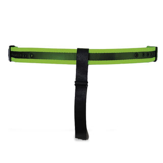 Shining Line Glow Jockstrap är ett grönt och svart justerbart bälte tillverkat av veganskt läder, med en vertikal svart rem som hänger från mitten.