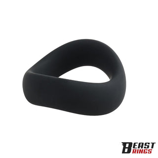 Svart penisring i silikon med en slät, vriden design; Beast Rings-logotypen syns längst ner till höger.