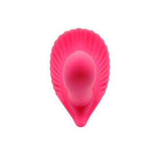 Handsfree-vibrator i rosa silikon med en muslingeskalsformad bas avsedd för klitorisstimulering, mot en vit bakgrund.