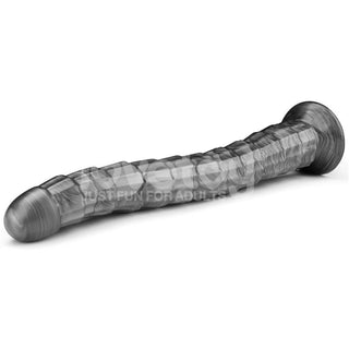 Grå, strukturerad analvibrator med en stabil bas, tillverkad av ett slätt material, avbildad mot en vit bakgrund.