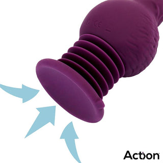 Lila silikonvibrator med fram- och återgående rörelse och sugkopp. De blå pilarna visar funktionerna för fram- och återgående rörelse och sug.