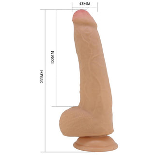 En realistisk silikondildo i en naturlig hudton med en böjbar kärna, ådrig design och sugbas.