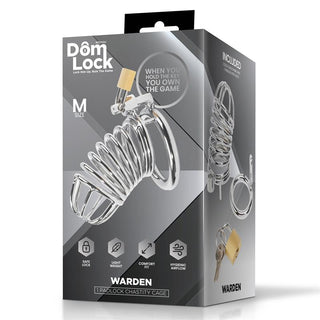 Domlock Warden Penisbur Metall M kyskhetsbur, silverfärgad metalldesign, visas på en grå bakgrund.
