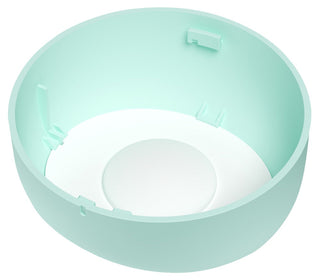 En mintgrön Tenga Puffy Masturbator med något upphöjt centrum, med mjuk silikon-design och clipshållare på sidorna för bättre grepp.