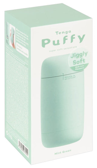 Tenga Puffy Masturbator Mint Grön har förpackningar som visar produktbilden, framhäver dess Jiggly Soft text och mjuka silikondesign för en unik upplevelse.