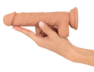 Banger Sexstol med dildo, med realistiska ådror, testiklar och ett ergonomiskt handtag; tillverkad av hudfärgat silikon.