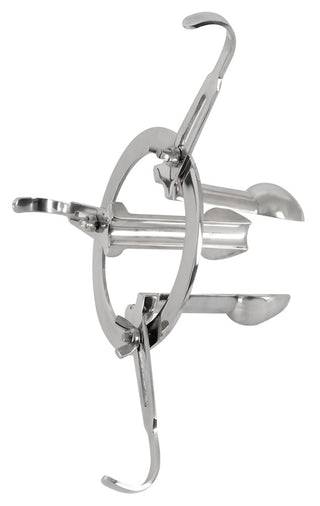 Anal Spreader Deluxe Stål har fyra fällbara metallpinnar som sträcker sig utåt i olika riktningar och visar upp sin distinkta design.