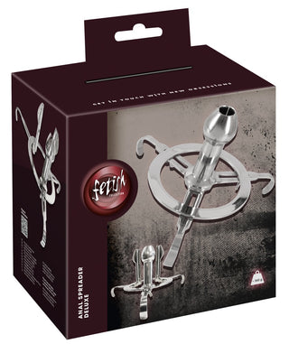 En låda visar Anal Spreader Deluxe Stål från Fetish Collection - ett spännande analspekulum i metall, perfekt för att förbättra din analleksaker-samling.