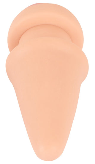 2in1 Buttplug Extension, ett mjukt, köttfärgat latextillbehör, visas upp mot en vit bakgrund.