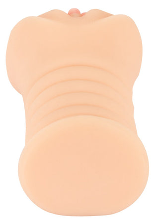 En hudfärgad Nature Skin-vaginamasturbator med rundad bas, räfflad insida och en design inspirerad av en kvinnokropp.