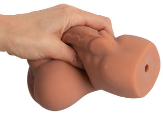 Realistixxx RealMan-analmasturbator i hudfärg, tillverkad av Real Skin TPE med en verklighetstrogen design.