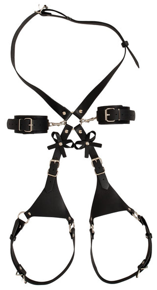 Svart läderharness med handbojor i metall och nitar, utformad som ett BDSM-bondage-tillbehör.